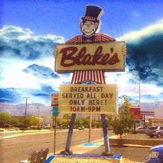 a sign that says breakfast served all day only here