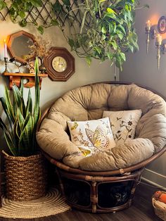 there is a chair and some plants in the room