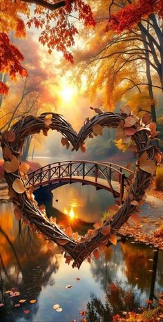 a heart shaped bridge with leaves on it