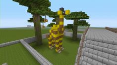 a yellow and brown giraffe standing in the middle of a park with trees