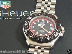 Stunning Retro TAG Heuer Formula one F1 Stainless Steel Black red dial WA1214 1980s Tag Heuer Watches, Tag Heuer 2000 Black Dial, Tag Heuer Formula 1 Red, Tag Heuer Formula 1 1980s, Tag Heuer Rally Master, Tag Heuer S/el, Tag Heuer 1980s, Tag Heuer Formula 1 Black, Tag Heuer 2000 Quartz