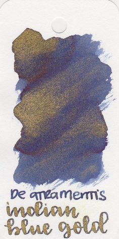 the ink is blue gold and it has some writing on it