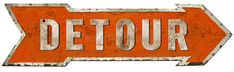an orange detour sign with the word detour written on it in white letters