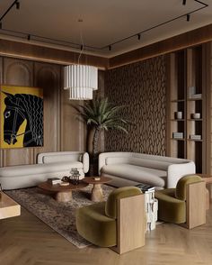 a living room filled with furniture and a large painting on the wall behind two couches