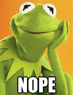kermie the frog is sitting with his hands on his face and eyes wide open