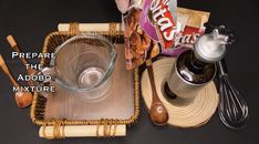an assortment of kitchen utensils and ingredients on a black table with the words prepare the adobo mixture
