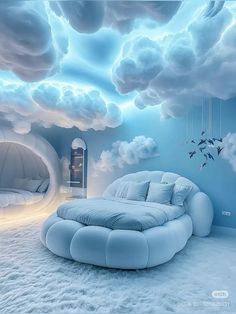 a bedroom with clouds painted on the ceiling