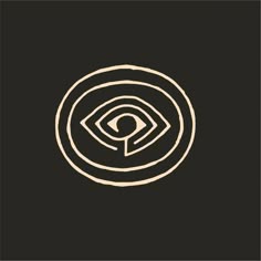 an eye in the center of a circle on a black background with a white outline