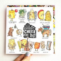 a hand holding up a birthday card with pictures of cheeses and other foods on it