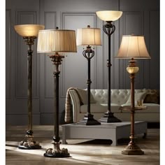 a living room scene with focus on the floor lamps