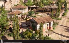 an old village surrounded by trees and rocks