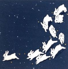 an image of rabbits flying in the sky with stars on it's back ground