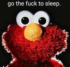 a red stuffed animal with the words kill written on it's face and eyes
