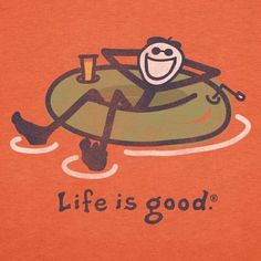 an orange shirt with a cartoon character floating on it's back and the words life is good