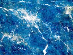 the water is blue and white with small bubbles