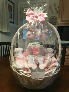 a basket filled with baby items on top of a table