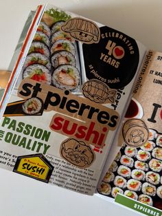 an open magazine with sushi images on it