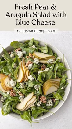Rocket/arugula salad topped with sliced pears, blue cheese and toasted walnuts.