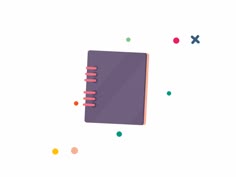 an open notebook sitting on top of a white surface next to colorful dots and circles