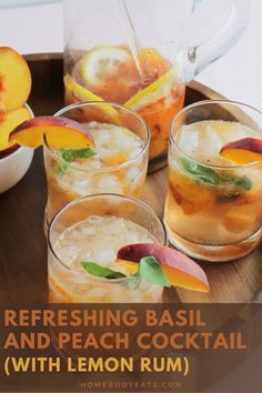 refreshing basil and peach cocktail with lemon rum recipe on a wooden serving platter topped with sliced peaches