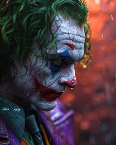 a close up of a person with makeup on and green hair wearing a joker costume