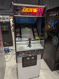 an old fashioned video game machine sitting on display
