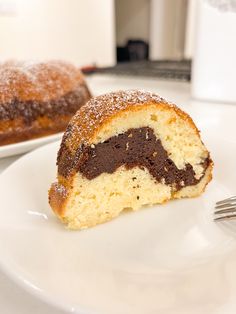 a piece of cake on a plate with a fork
