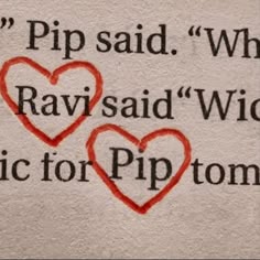 two hearts drawn on the side of a piece of paper with words written in it