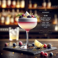 an advertisement for a gin cocktail with berries and lemon wedges on the bar counter