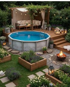 an above ground pool surrounded by wooden planters and lights in the middle of a yard