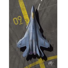 a fighter jet sitting on top of an airport tarmac next to a yellow line