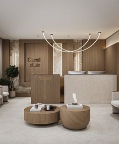 a room that has some tables and chairs in it with lights hanging from the ceiling