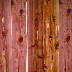 the wood paneled wall is made from different types of boards