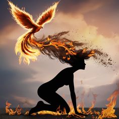 a woman kneeling down in front of a fire bird
