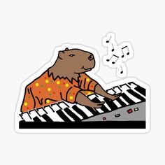 a bear that is playing the piano sticker