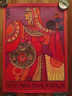 the poster is hanging on the wall