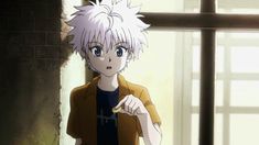 an anime character standing in front of a window