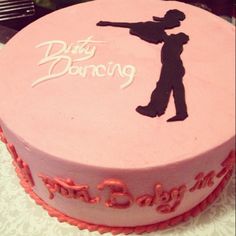 a birthday cake decorated with the silhouette of a man holding a baseball bat on top of it