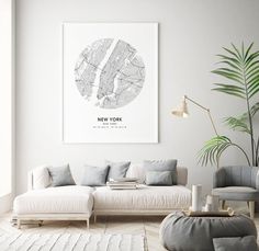a living room filled with furniture and a large poster on the wall above it that says new york