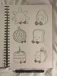a notebook with some drawings on it