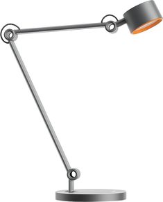 a desk lamp with an orange light on it's side and a metal base