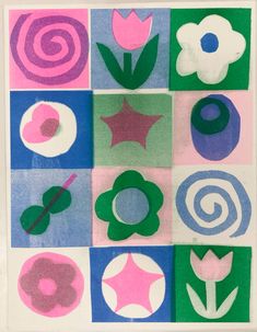 an art project with flowers and spirals on it's sides in different colors