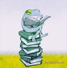 a frog sitting on top of a stack of books