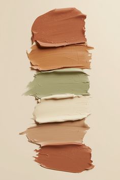 five different shades of paint arranged in the shape of a rectangle on top of each other