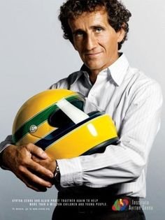 a man holding a yellow motorcycle helmet in his hands