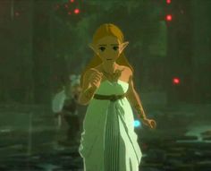 a woman in a white dress standing next to a forest with red lights on it