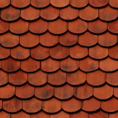 an orange roof that has been made out of red clay and is being used as a background