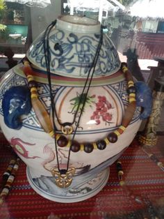 a large vase sitting on top of a table