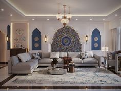 a living room filled with lots of furniture next to a large wall hanging on the wall