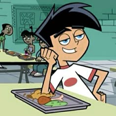 a cartoon boy is eating some food in the classroom